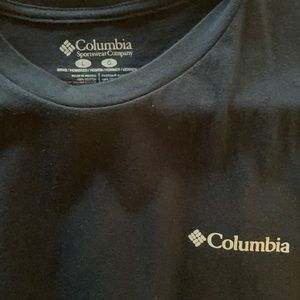 Columbia sports wear T. Navy blue.